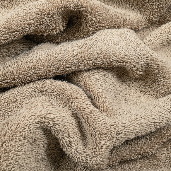 Toalla de baño beige lisa de algodón 100%