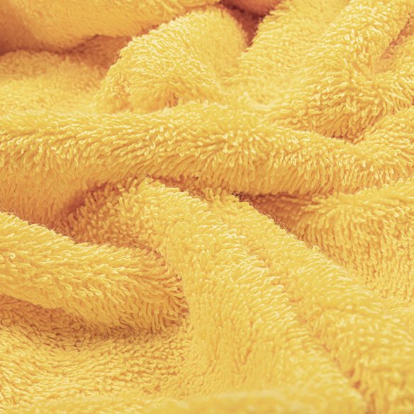 Toalla de baño amarilla lisa de algodón 100%